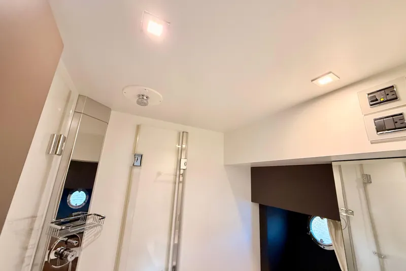 Slide: The Image of Modern bathroom interior of 2016 Cranchi M44 HT yacht with sleek fixtures and lighting. - 108