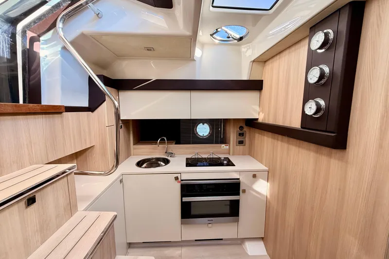 Slide: The Image of Modern kitchen interior of 2016 Cranchi M44 HT yacht with sleek design and appliances. - 45