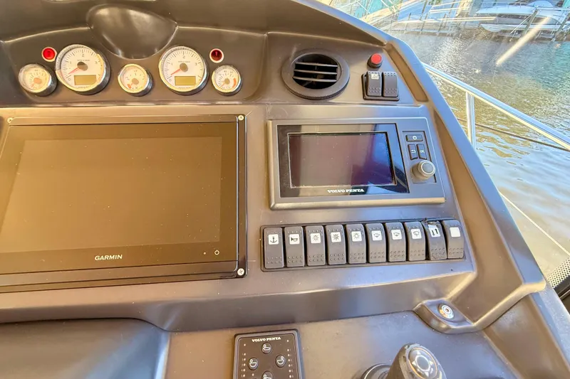 Slide: The Image of Control panel of 2016 Cranchi M44 HT yacht with Garmin and Volvo Penta displays. - 35