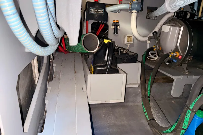 Slide: The Image of Engine room of 2016 Cranchi M44 HT yacht with various mechanical components. - 162