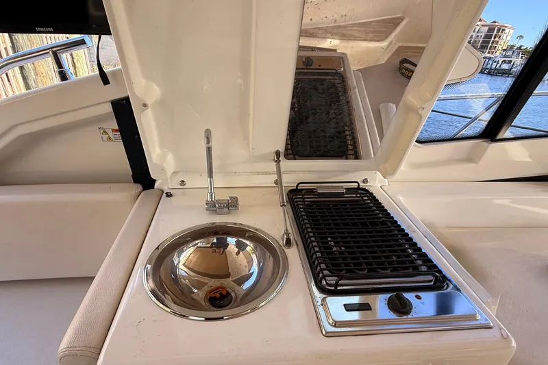 Slide: The Image of Outdoor kitchen on 2016 Cranchi M44 HT yacht with sink and grill. - 135