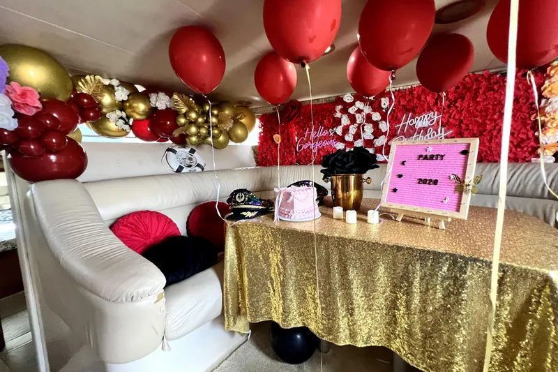 Slide: The Image of Luxurious 2002 Sea Ray 450 Express Bridge decorated for a festive party with balloons and flowers. - 32