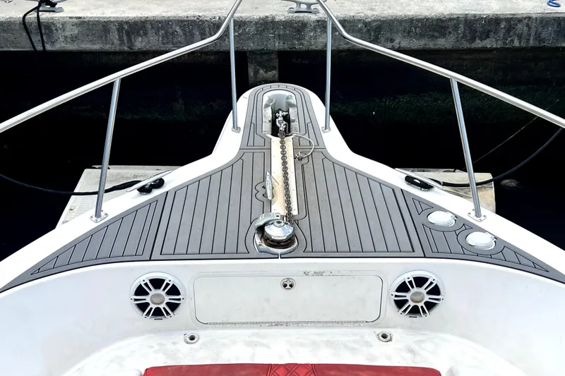 Slide: The Image of Bow of 2002 Sea Ray 450 Express Bridge with anchor and deck details. - 46