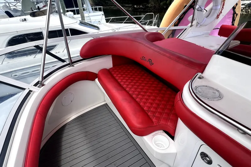 Slide: The Image of Red seating area on 2002 Sea Ray 450 Express Bridge yacht deck. - 44