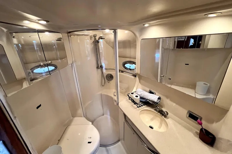 Slide: The Image of Luxurious bathroom interior of 2002 Sea Ray 450 Express Bridge yacht. - 37