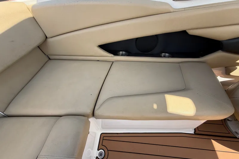 Slide: The Image of Beige seating area on 2016 Glastron GT 245 boat, featuring comfortable cushions. - 68