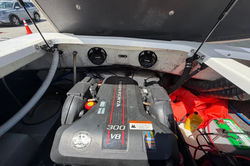 Slide: The Image of 2016 Glastron GT 245 boat engine compartment with Volvo Penta 300 V8 engine. - 73