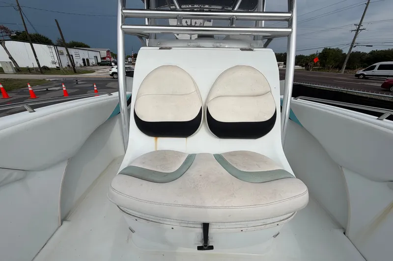 Slide: The Image of 2001 Baja 340 Islander Outboard boat seating area with dual cushioned seats. - 48