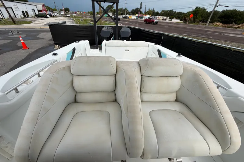 Slide: The Image of 2001 Baja 340 Islander Outboard boat with dual seats and visible outboard motors. - 54