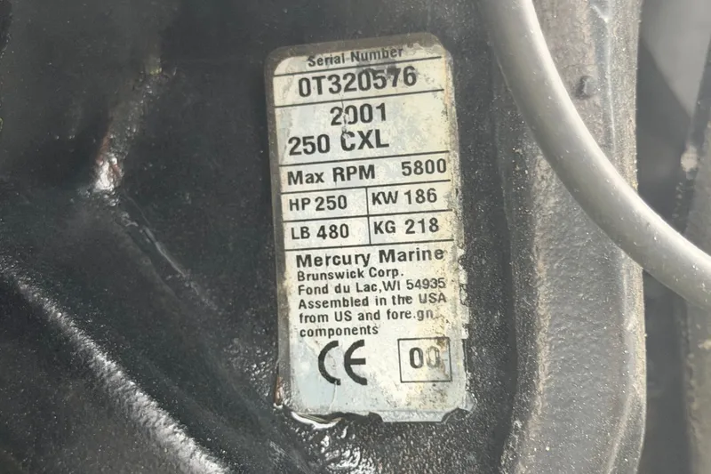 Slide: The Image of Label on a 2001 Baja 340 Islander Outboard engine, showing specifications and serial number. - 76