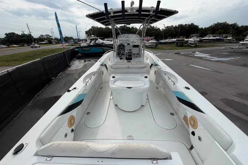 Slide: The Image of 2001 Baja 340 Islander Outboard boat interior, featuring spacious seating and modern controls. - 14