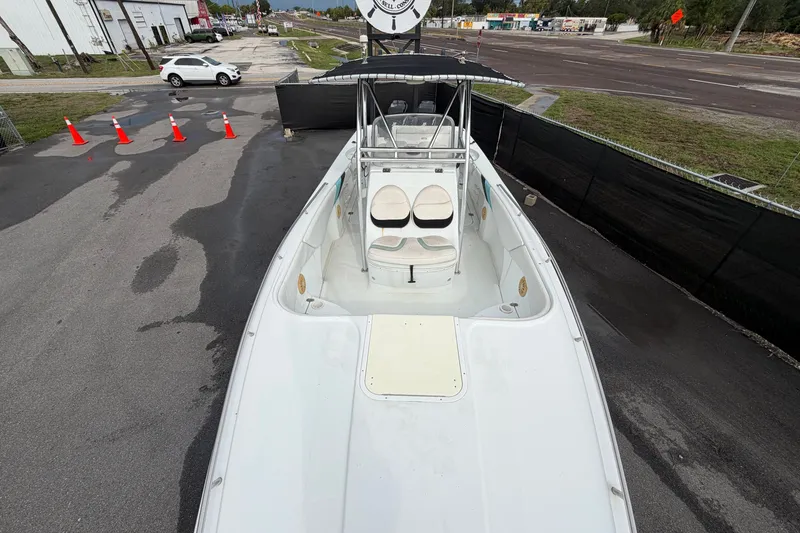 Slide: The Image of 2001 Baja 340 Islander Outboard boat on display in a parking lot. - 47