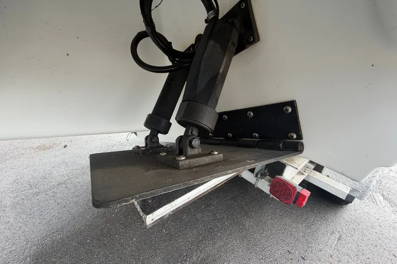 Slide: The Image of 2001 Baja 340 Islander Outboard trim tab and hydraulic system on trailer. - 5