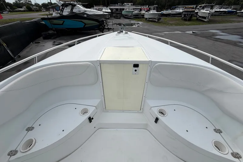 Slide: The Image of 2001 Baja 340 Islander Outboard boat interior with seating and cup holders. - 35