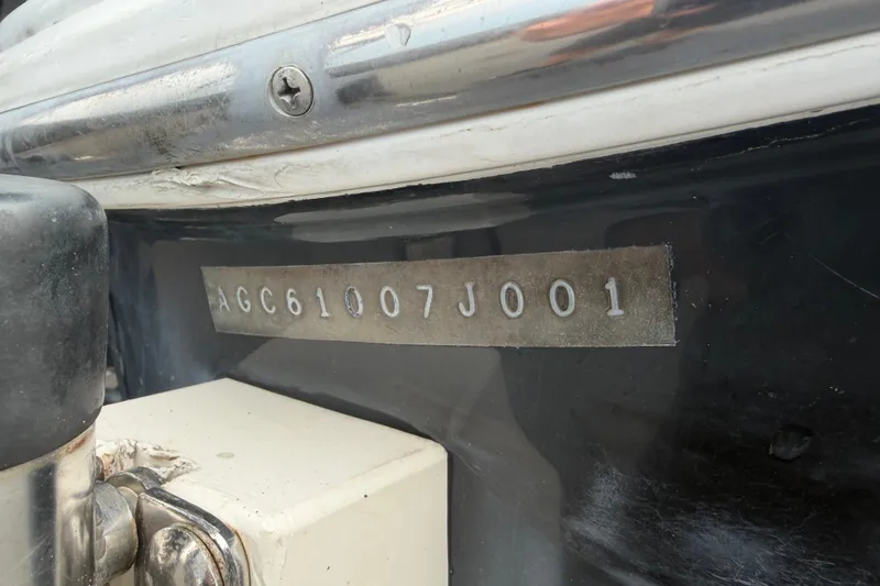 Slide: The Image of Hull identification number on a 2001 Baja 340 Islander Outboard boat. - 74
