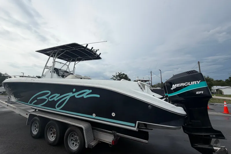 Slide: The Image of 2001 Baja 340 Islander Outboard boat on trailer with Mercury EFI engine. - 9