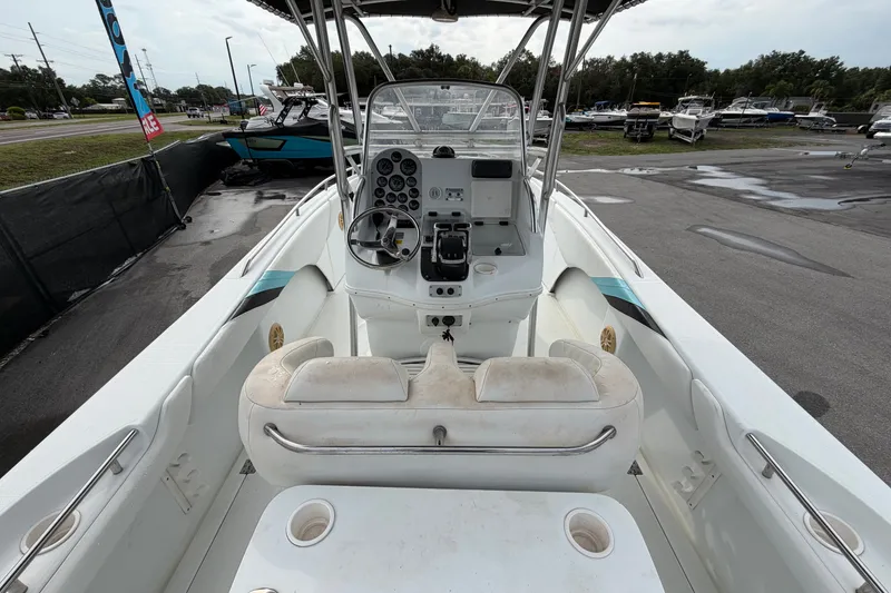 Slide: The Image of 2001 Baja 340 Islander Outboard boat interior with steering console and seating. - 20