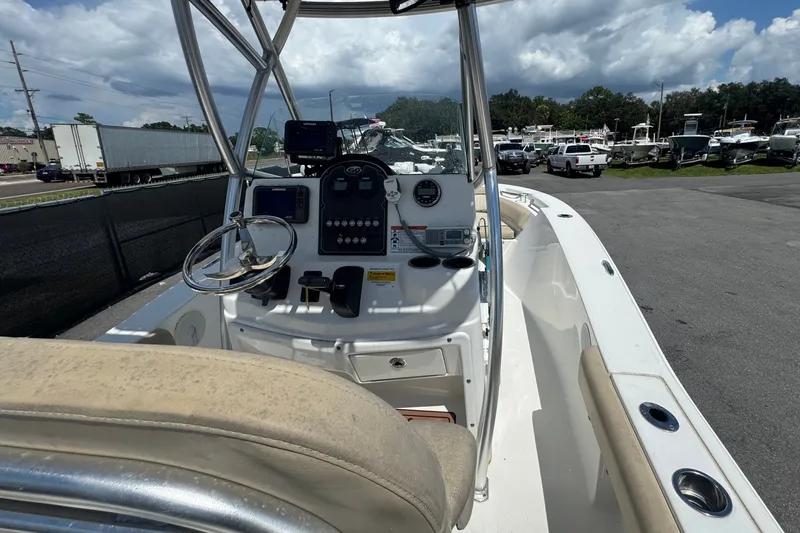 Slide: The Image of 2016 Sea Fox 206 Commander boat interior with steering console and seating. - 20