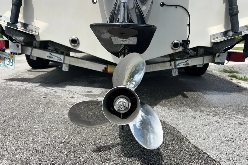 Slide: The Image of Propeller of a 2016 Sportsman Heritage 231 Center Console boat on a trailer. - 5
