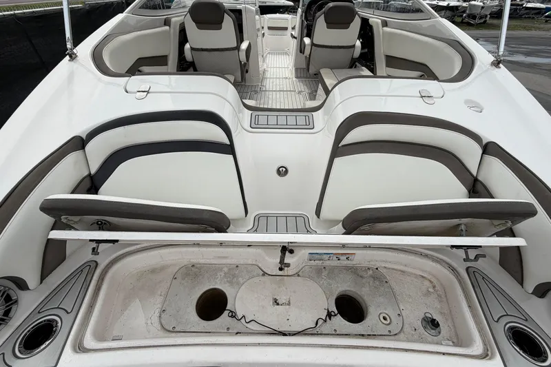 Slide: The Image of 2016 Yamaha Boats 242 Limited S E-Series interior with seating and storage compartments. - 14