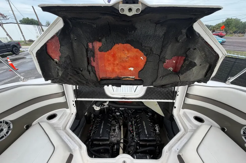 Slide: The Image of 2016 Yamaha Boats 242 Limited S E-Series engine compartment with open hatch. - 52