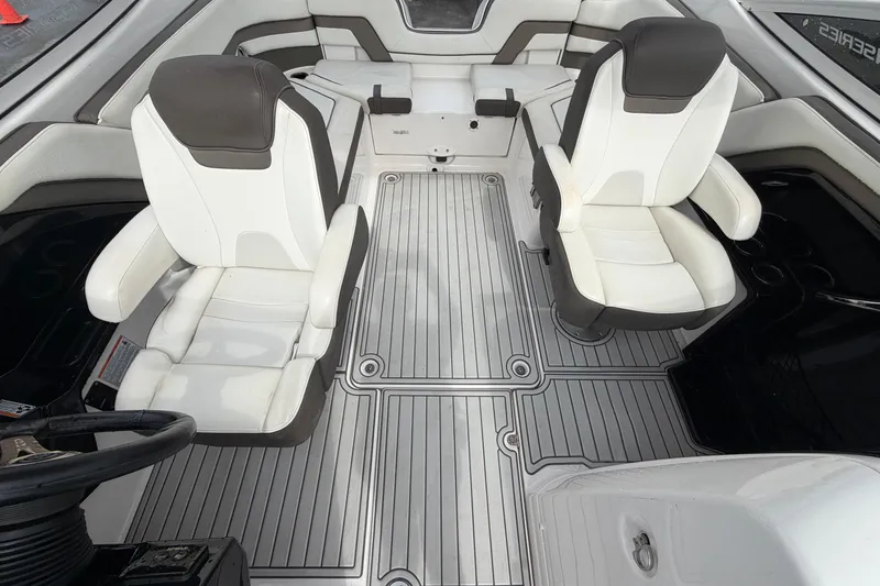 Slide: The Image of Interior of 2016 Yamaha Boats 242 Limited S E-Series, featuring sleek seating and modern design. - 47