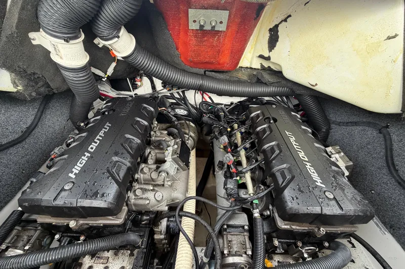 Slide: The Image of Engine compartment of a 2016 Yamaha Boats 242 Limited S E-Series, featuring high output engines. - 53