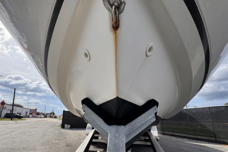 Slide: The Image of Close-up of the bow of a Boston Whaler 270 Vantage on a trailer. - 17