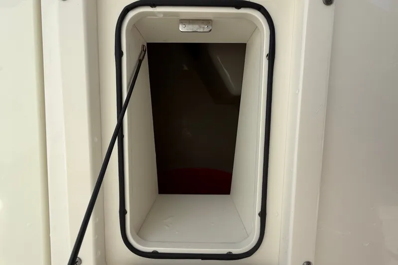 Slide: The Image of Storage compartment on a 2015 Boston Whaler 270 Vantage boat. - 47