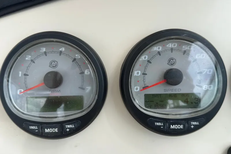 Slide: The Image of Close-up of RPM and speed gauges on a 2015 Boston Whaler 270 Vantage boat. - 39