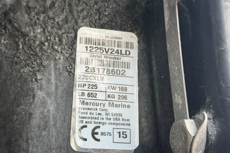 Slide: The Image of Label on a 2015 Boston Whaler 270 Vantage, showing Mercury Marine engine specifications. - 78