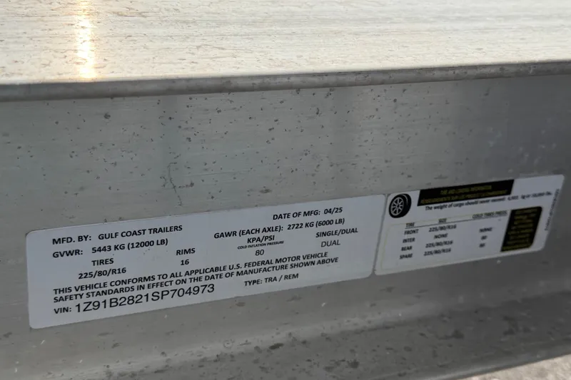 Slide: The Image of Trailer label showing specifications for Gulf Coast Trailers, including GVWR and tire details. - 80
