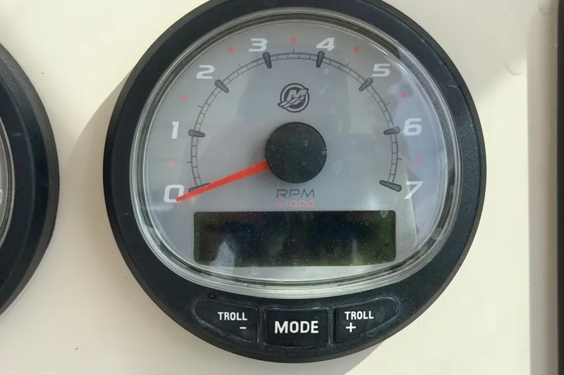 Slide: The Image of Tachometer of 2015 Boston Whaler 270 Vantage boat, displaying RPM and troll mode controls. - 40