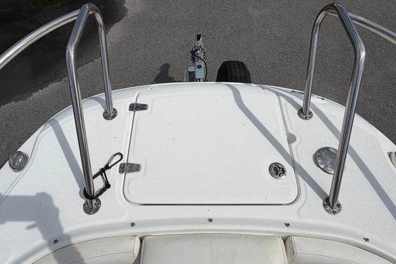 Slide: The Image of 2015 Boston Whaler 270 Vantage boat deck with stainless steel railings. - 51
