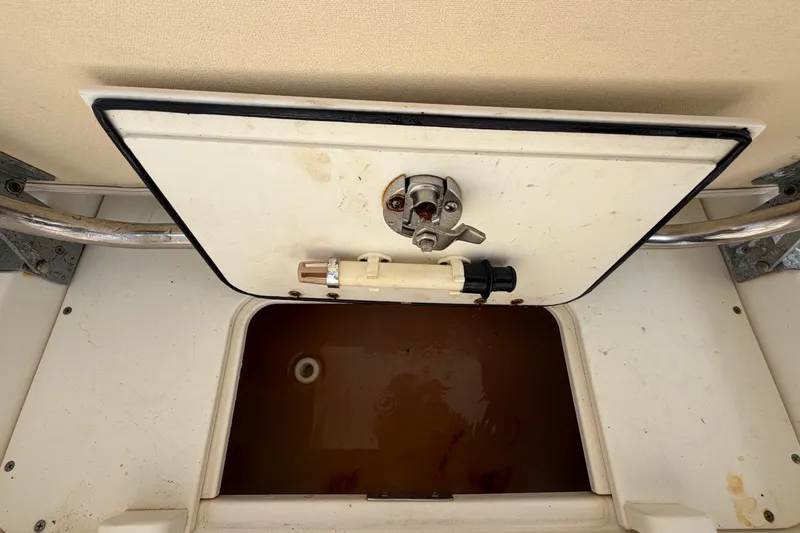 Slide: The Image of Open storage compartment on a 2015 Boston Whaler 270 Vantage boat. - 67