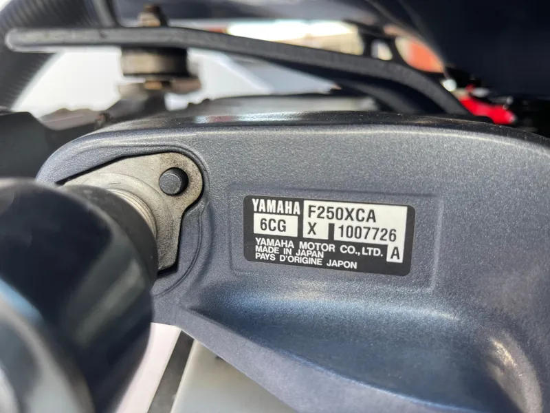 Slide: The Image of Close-up of Yamaha F250XCA engine label on a 2015 Century 2301 boat. - 37