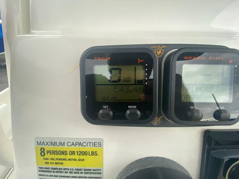 Slide: The Image of Century 2301 boat dashboard with tachometer and speed fuel gauges, 2015 model. - 27