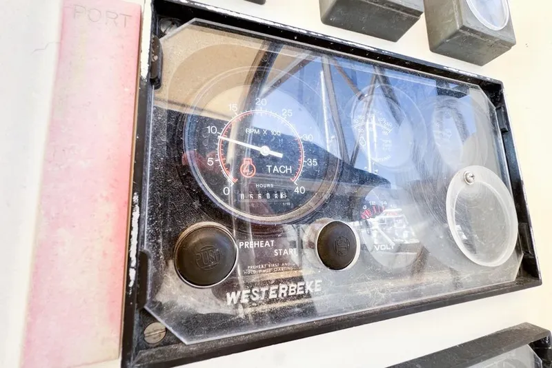 Slide: The Image of Control panel of a 2000 Leopard 38 boat with Westerbeke tachometer. - 29