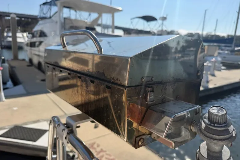 Slide: The Image of Stainless steel grill on a Leopard 38 yacht, docked at a marina. - 146