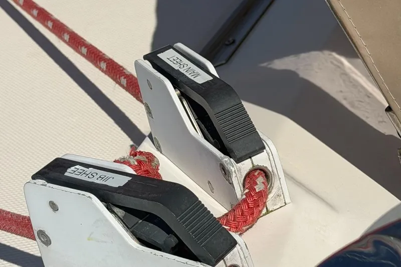 Slide: The Image of Close-up of rope clutches on a 2000 Leopard 38 sailboat deck. - 140