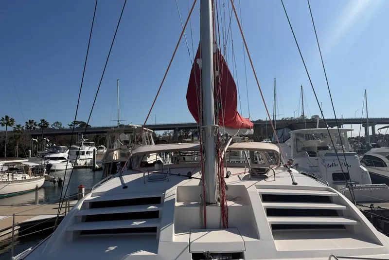 Slide: The Image of Leopard 38 catamaran from 2000 docked in a sunny marina. - 123