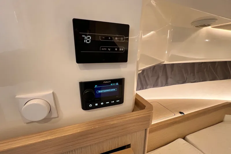 Slide: The Image of 2024 Skamander 100 Sorrento interior with control panels and modern design. - 194