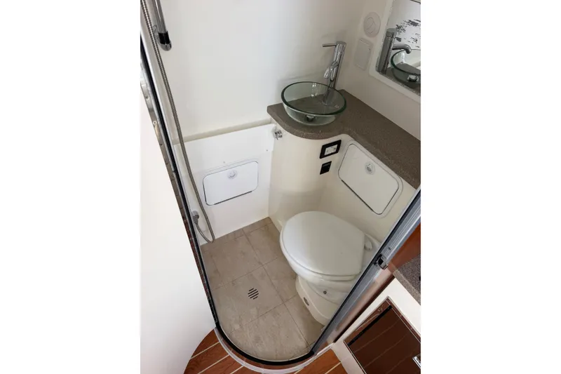 Slide: The Image of 2019 Regulator 41 boat bathroom with modern sink and toilet. - 40