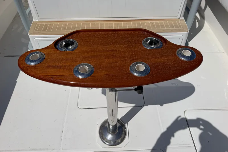 Slide: The Image of Wooden fishing rod holder on 2019 Regulator 41 boat deck. - 23