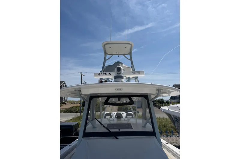 Slide: The Image of 2019 Regulator 41 boat with Garmin xHD2 radar under clear blue sky. - 21