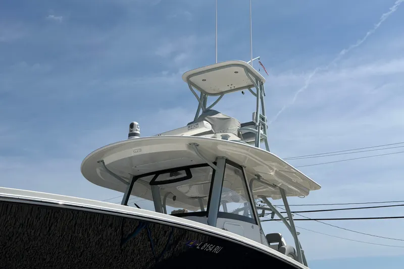 Slide: The Image of 2019 Regulator 41 boat with tower against a clear blue sky. - 5