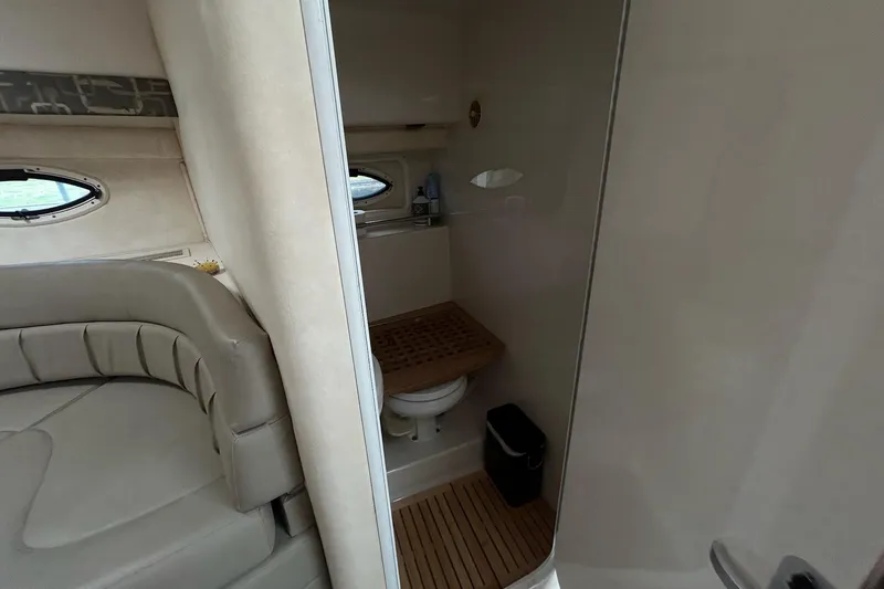 Slide: The Image of Interior of 2000 Monterey 330 Sport Yacht showing bathroom and seating area. - 53