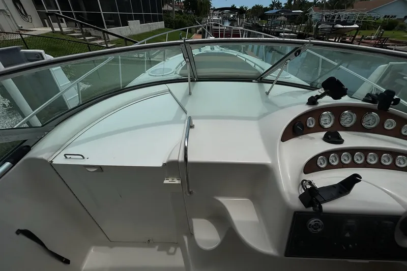 Slide: The Image of Cockpit view of 2000 Monterey 330 Sport Yacht with dashboard and gauges. - 30