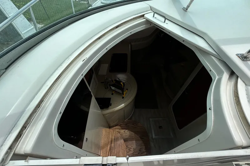 Slide: The Image of Interior view of a 2000 Monterey 330 Sport Yacht cabin entrance. - 32
