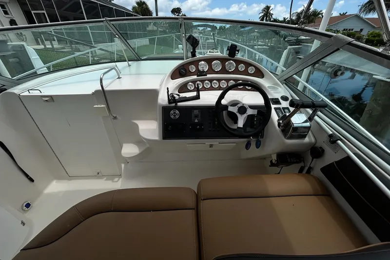 Slide: The Image of Cockpit of 2000 Monterey 330 Sport Yacht with steering wheel and instrument panel. - 19